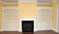 Clearwater, fireplace with flanking bookcases